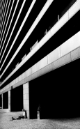 girl_reading_under_building.jpg